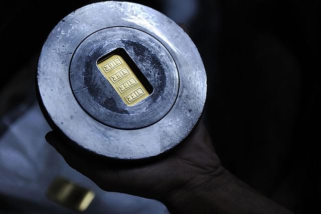 A  stamping die containing a 50g standard gold bar at the National Indian Bullion Refinery’s gold and silver refinery in Mumbai. (INDRANIL MUKHERJEE/AFP/Getty Images)