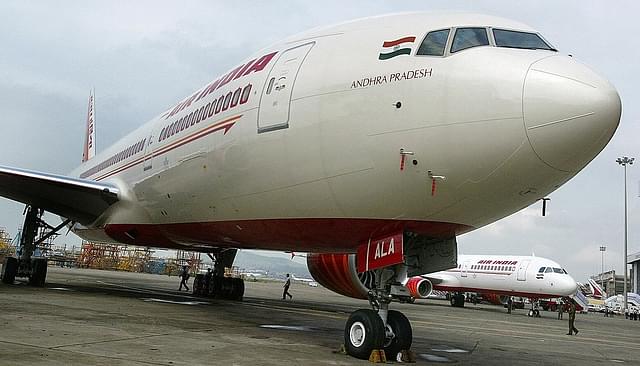 The Boeing 777-200 LR ‘Andhra Pradesh’ on the tarmac of the Chattrapati Shivaji International airport in Mumbai (INDRANIL MUKHERJEE/AFP/Getty Images)