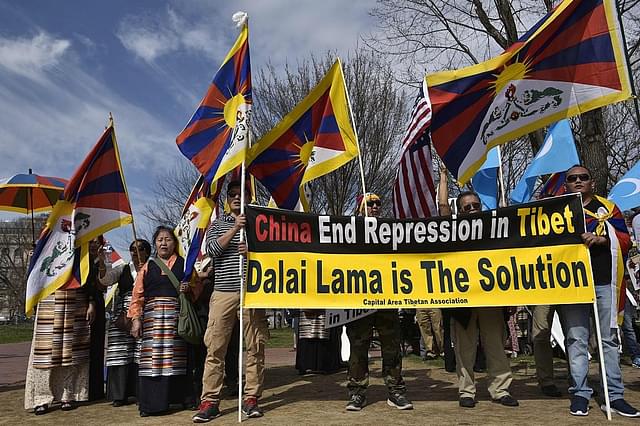 
Demonstrators take part in a rally against China’s alleged abuses 
in Tibet. (MANDEL NGAN/AFP/Getty 
Images)

