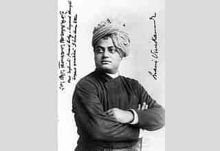 Swami Vivekananda, September 1893, Chicago. On the left, Vivekananda wrote, “one infinite pure and holy – beyond thought beyond qualities I bow down to thee.”