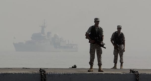 Indian Navy’s commandos stand guard during a the Fleet Review in Mumbai on December 20, 2011. (PUNIT PARANJPE/AFP/Getty Images)