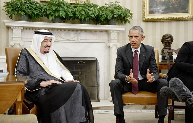 Former US President Barack Obama speaks as King Salman bin Abd al Aziz of Saudi Arabia looks on in the White House. (Olivier Douliery-Pool/Getty Images)