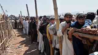Afghan refugees forced out of Pakistan.