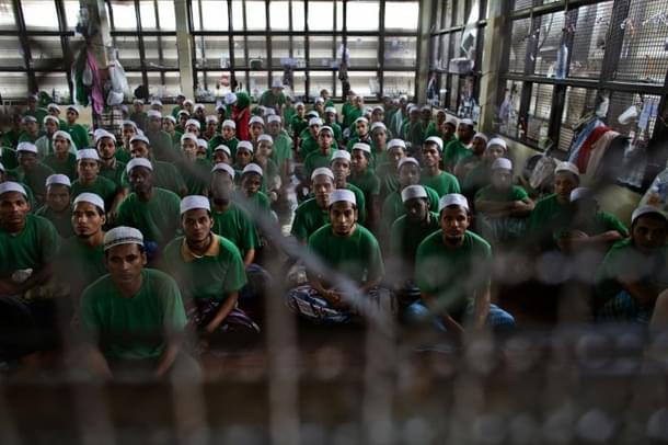 Illegal 
Rohingya 
immigrants 
gather at an Immigration Detention Centre.