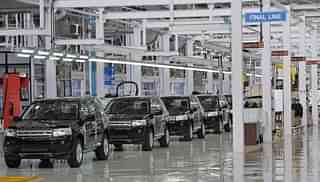 

Land Rover Freelander II SUV vehicles are seen on the assembly line at the Jaguar - Land Rover manufacturing plant at Pimpri, in the western Indian state of Maharashtra. (INDRANIL MUKHERJEE/AFP/GettyImages)