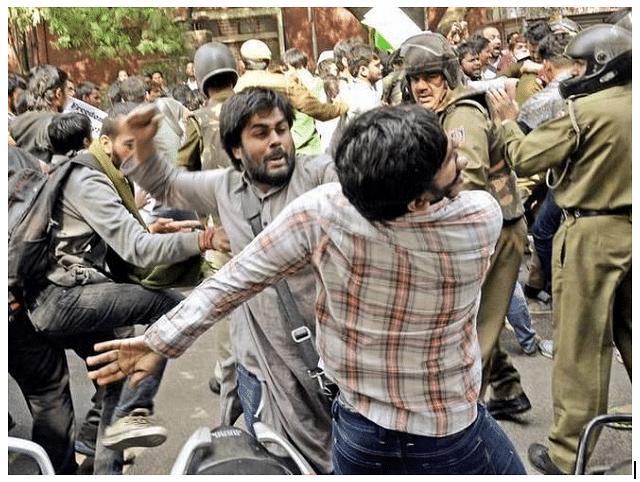 SFI’s Delhi president Prashant Mukherjee thrashing a student of Delhi University. (The Hindu)