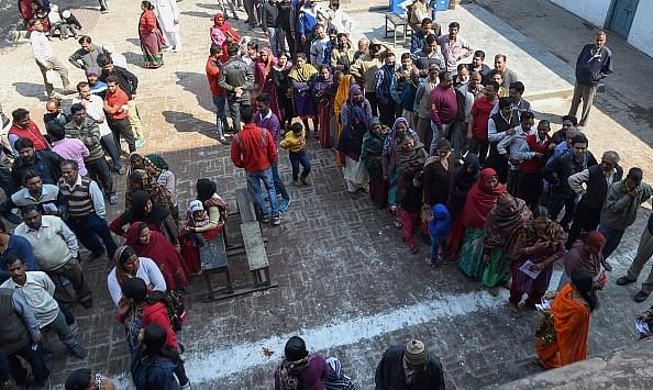 

Indian voters stand in a queue at a polling station in Muzaffarnagar in Uttar Pradesh on February 2017. (PRAKASH SINGH/AFP/GettyImages)