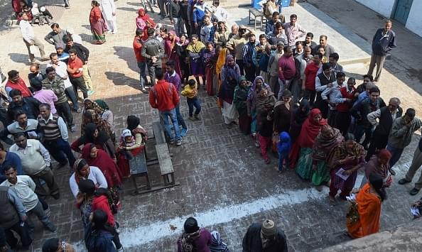 Indian voters stand in a queue at a polling station in Muzaffarnagar in Uttar Pradesh on February 2017. (PRAKASH SINGH/AFP/GettyImages)