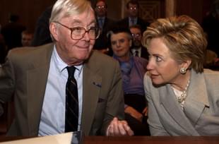 Daniel Patrick Moynihan talks with Hillary Clinton before the start of the nomination
of Theresa Alvillar-Speake. (Douglas Graham/Roll
Call/Getty Images)