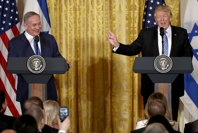  
US President Donald Trump (R) and
 Israel Prime Minister Benjamin Netanyahu (L) answer questions during a 
joint news conference. (Win McNamee/Getty Images)


