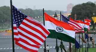 Flags of India and the United States near India Gate in New Delhi.   