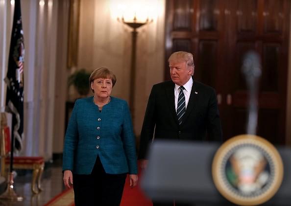 US President Donald Trump with German Chancellor Angela Merkel (Justin Sullivan/Getty Images)