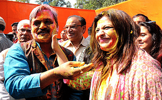Shazia Ilmi with Satish Upadhyay during BJP Holi Milan at Delhi BJP office in New Delhi.
