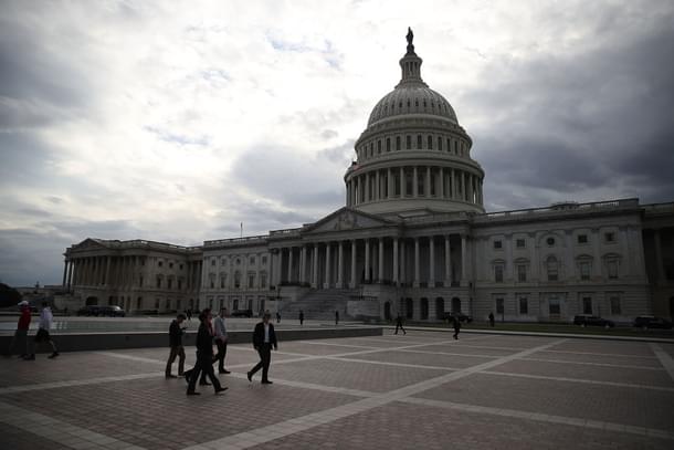 Clouds pass over the US Capitol in Washington, DC. (Mark Wilson/Getty Images)