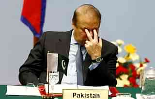 
Pakistani Prime Minister Nawaz 
Sharif reacts as he attends the opening session of 18th SAARC summit in Kathmandu.<br>

