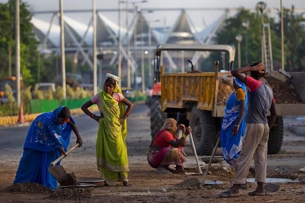 

Unskilled workers in New Delhi. (Daniel Berehulak/GettyImages)