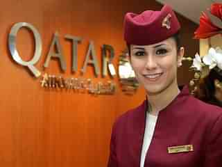An air hostess of Qatar Airways at the International Tourism Fair. (Andreas Rentz/GettyImages) &nbsp;
