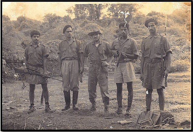 

Prabhaker Trivikram Vaidya, centre, with his men
