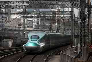 A Bullet Train pulls into Tokyo Station. (Photo Credit: Carl Court/Getty Images)