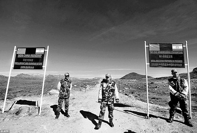Indian army soldiers stand guard at the Indo-China border in Arunachal Pradesh
