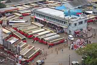 Kerala State Road Transport Corporation (KSRTC) buses at a bus depot (EyesWideOpen/Getty Images)