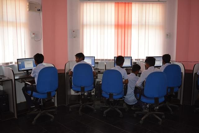 Students at the computer lab at Aastha Vidya Mandir, Dantewada