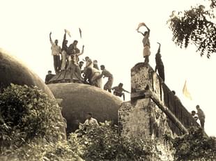 Hindu youth atop the disputed structure in Ayodhya 