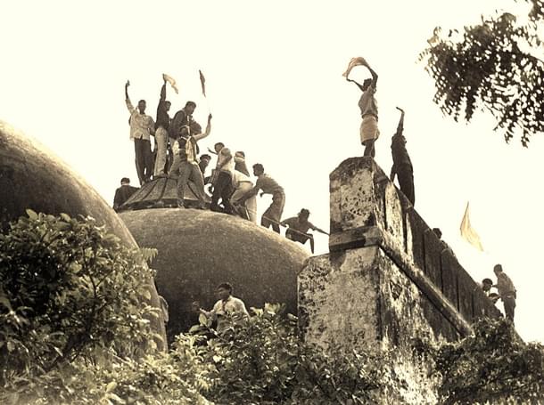 Hindu youth atop the disputed structure in Ayodhya 