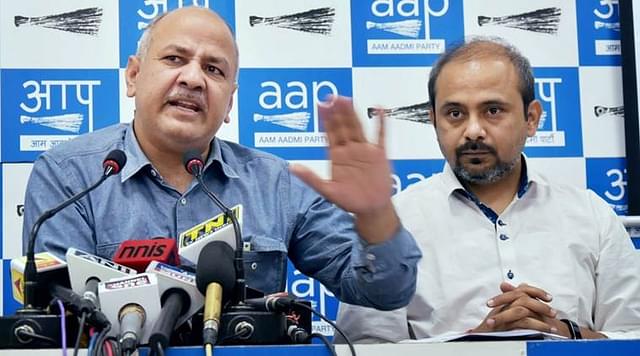 
 Delhi Deputy Chief Minister Manish Sisodia with party leader Dilip Pandey.&nbsp;

