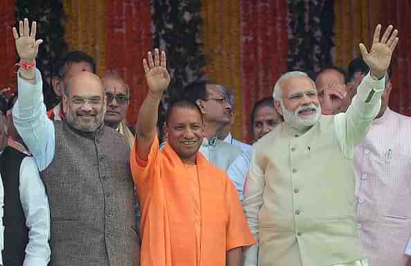 Narendra Modi, Yogi Adityanath and Amit Shah (SANJAY KANOJIA/AFP/Getty Images)