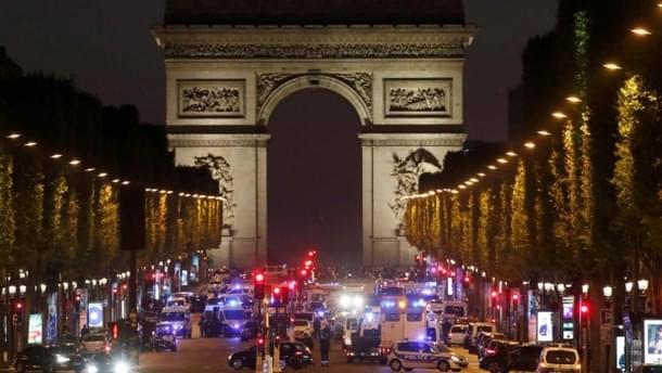 Police secure the Champs Elysees Avenue after one policeman was killed.
