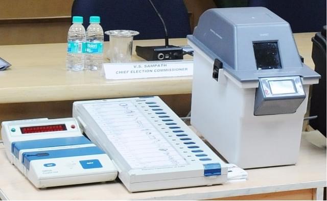 Image of a Voter Verifiable Paper Audit Trail (VVPAT) machine with an EVM, or electronic voting machine. (PIB)