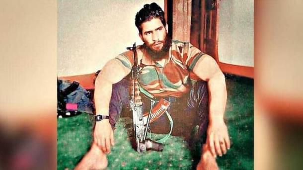 A screenshot of a video showing Ansar Ghazwa’tul-Hind commander Zakir Musa.