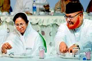West Bengal Chief Minister Mamata Banerjee, left, with Imam Barkati. (PTI)


