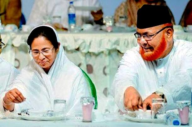 West Bengal Chief Minister Mamata Banerjee, left, with Imam Barkati. (PTI)