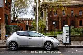 A Nissan Leaf charging at a public charging point (Miles Willis/Stringer)