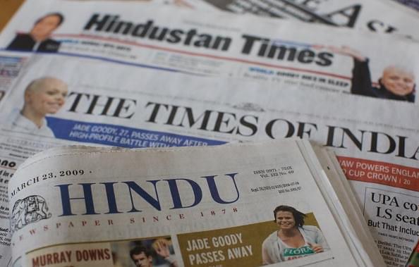 Popular Indian newspapers. (Daniel Berehulak/Getty Images)