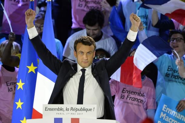 Macron greets voters before a political meeting at Grande Halle de La Villette in Paris.(Aurelien Meunier/GettyImages)