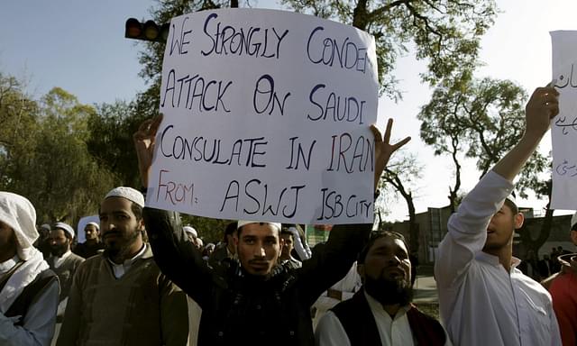 Pakistani Sunni Muslims shout slogans against Iran during a protest in Islamabad. 