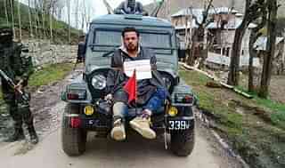 

                  
Farooq Ahmad Dar, a resident of Kashmir’s Beerwah town, tied to an army vehicle. 


                

