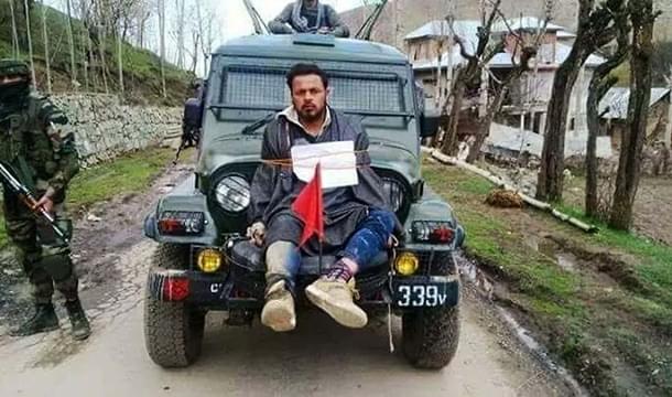 Farooq Ahmad Dar, a resident of Kashmir’s Beerwah town, tied to an army vehicle.