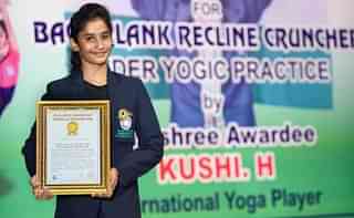 Khushi set the world record for performing Poorna Chakrasana