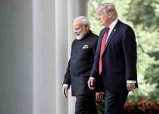 US President Donald Trump and Prime Minister Narendra Modi walk from the Oval Office to deliver joint statements in the Rose Garden of the White House. (Win McNamee/Getty Images)