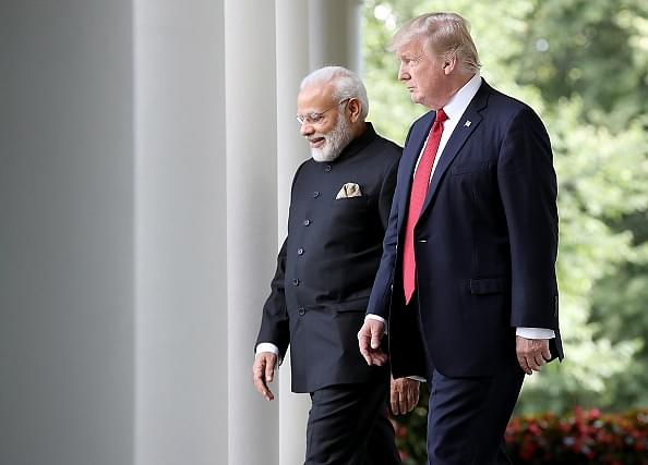 US President Donald Trump and Prime Minister Narendra Modi walk from the Oval Office to deliver joint statements in the Rose Garden of the White House. (Win McNamee/Getty Images)