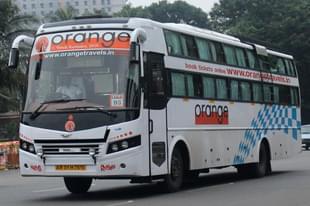 An Orange Travels Bus with an Arunachal registration (Photo Credit: Vivek Ravindra/ BCM Touring)