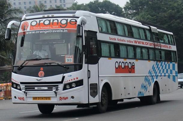 An Orange Travels Bus with an Arunachal registration (Photo Credit: Vivek Ravindra/ BCM Touring)