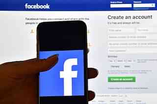 Can Facebook meddle or otherwise with, or influence, human minds, en masse? (Carl Court/Getty Images)
