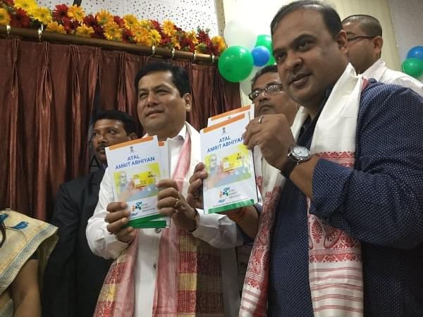 Assam Chief Minister Sarbananda Sonowal and Minister Himanta Biswa Sarma at the launch of Atal Amrit Abhiyan, a health assurance scheme for the poor. (Himanta Biswa Sarma/Twitter)