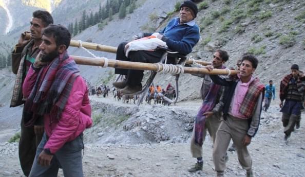 Atop a palanquin (Waseem Andrabi/Hindustan Times via Getty Images)