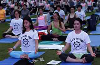 People celebrating Yoga Day in South Korea (Photo Credit: Chung Sung-Jun/Getty Images)